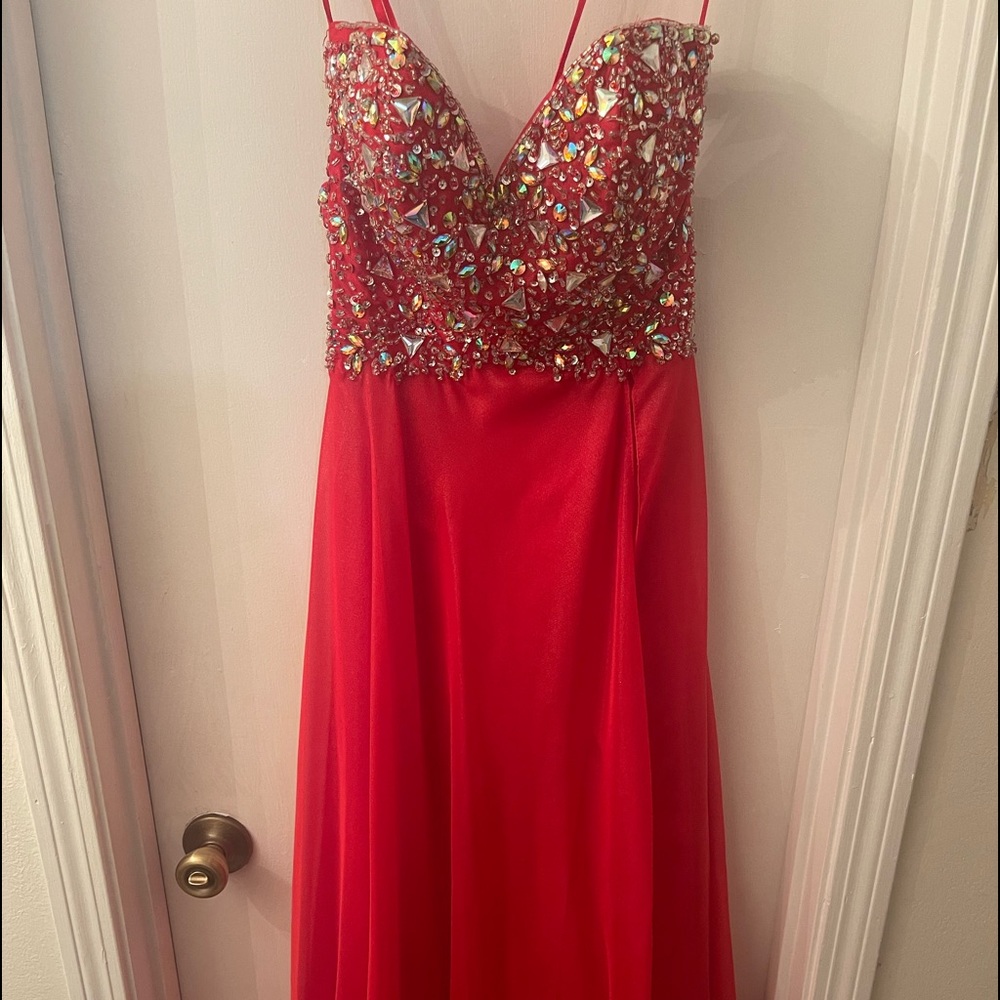 Mori Lee. Red beaded strapless gown.